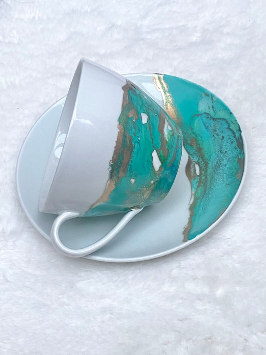 Hand-Painted White Porcelain Teacup and Saucer